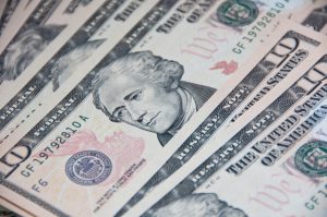 Macro of image the face of Alexander Hamilton on the Ten American Dollar Bill.